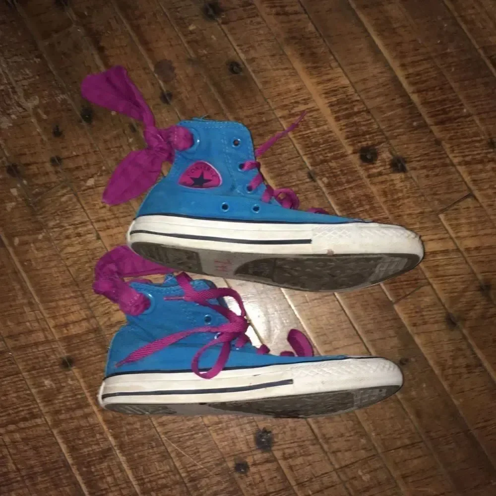 Converse blue and purple bow high top sneakers